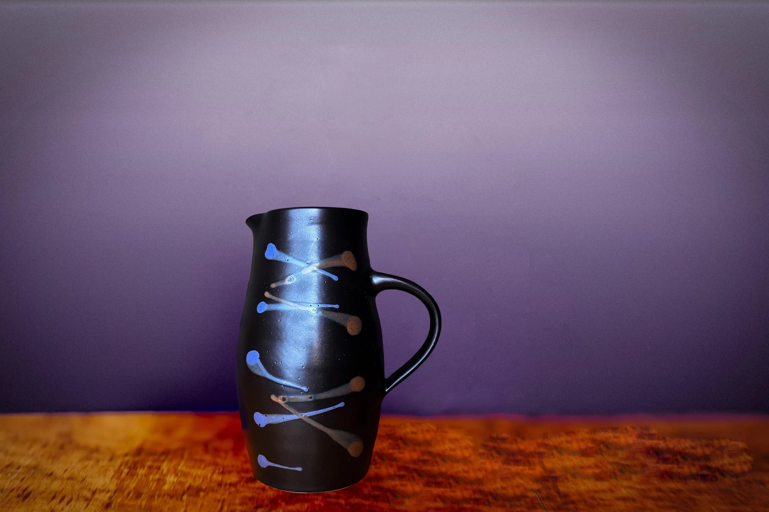 Charles Kelly Black Ceramic Pitcher