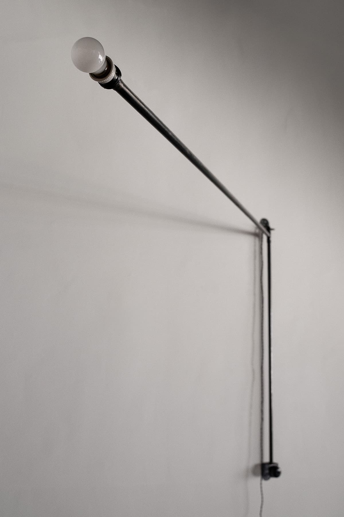Swiveling Potence Wall Lamp