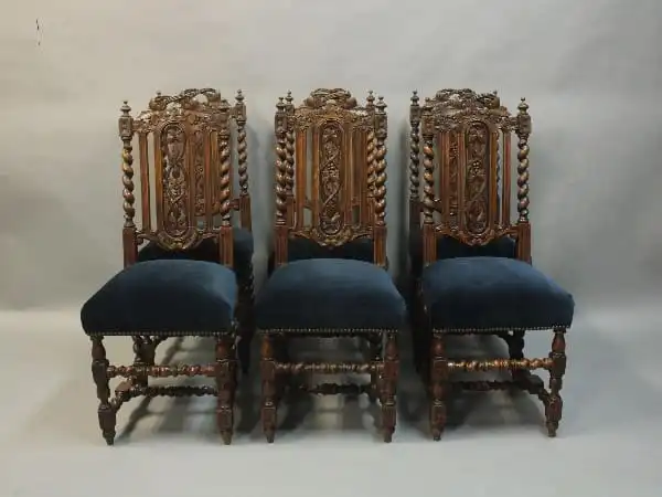16029. Elegant Set Of Carved Spanish Revival Chairs With Velvet Upholstery