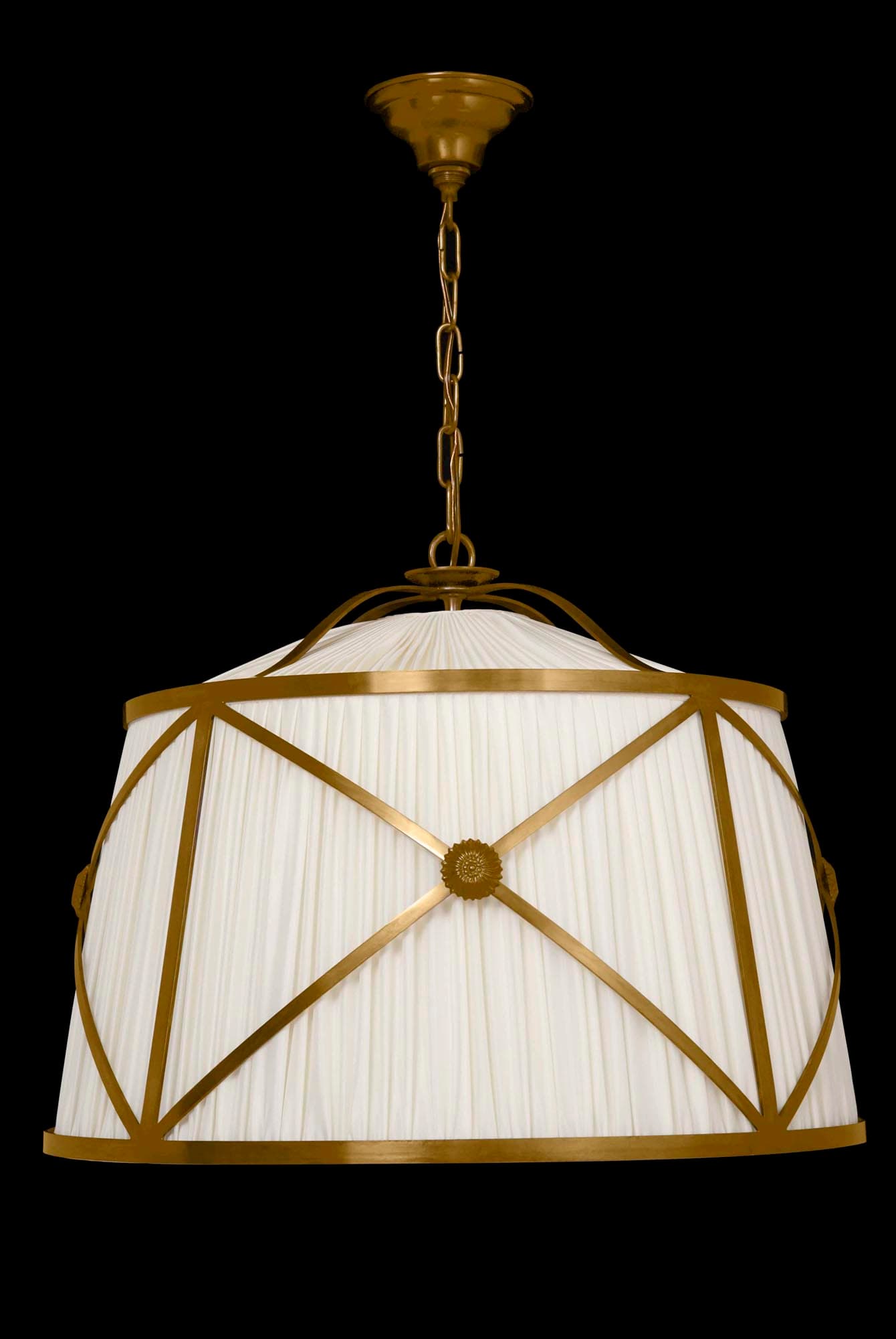 Modern brass drum pendant light with a pleated white shade, crosshatched brass frame, and chain suspension.
