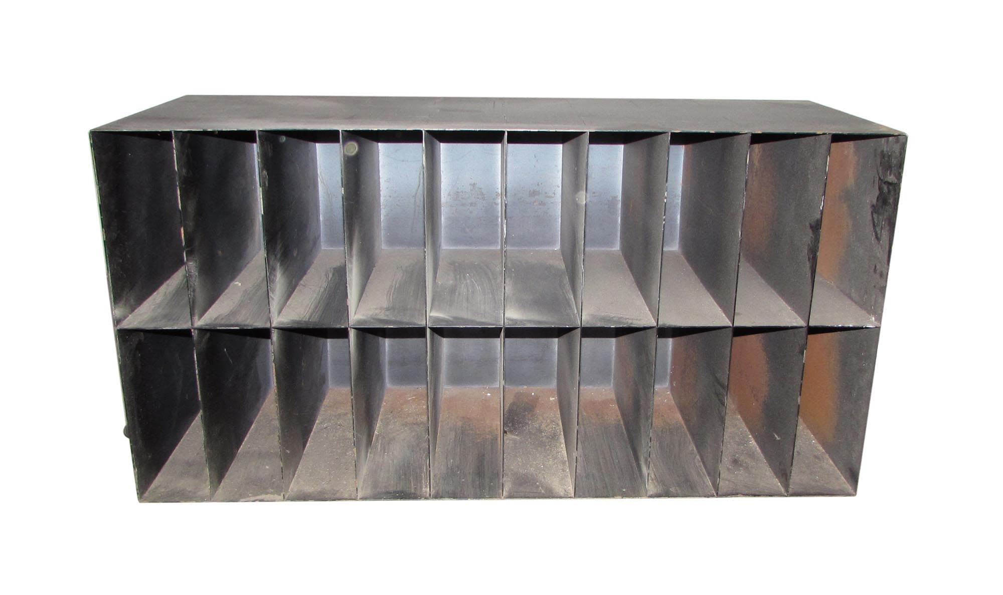 Black metal cabinet with 20 open cubby compartments shown from the front.