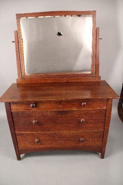10612. Arts And Crafts Gustav Stickley Dresser With Mirror Circa 1910 with a large square mirror, featuring visible wear and a small, dark blemish on the mirror.