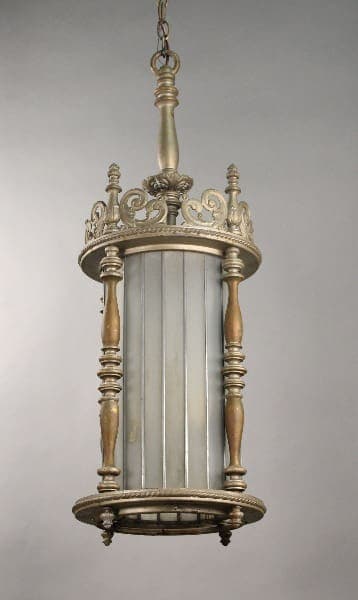 An ornate 10721. Impressive Large Scale 1920's Spanish Revival Glass Pendant with a crown-like top, vertical bars, and decorative elements, suspended against a plain background.