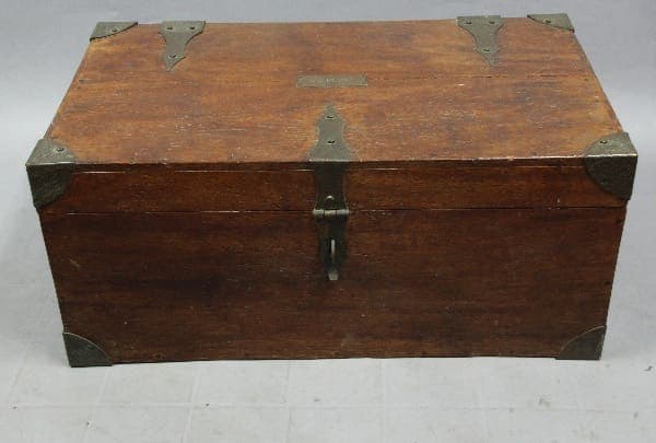 12424. Arts And Crafts Trunk With Hammered Bronze Hardware with a front latch, on a plain background.