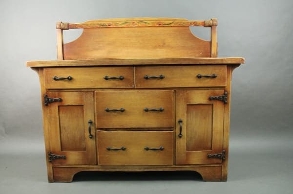 14329. Signed Coronado Sideboard with ornate handles, featuring two cabinets and three drawers, set against a grey background.