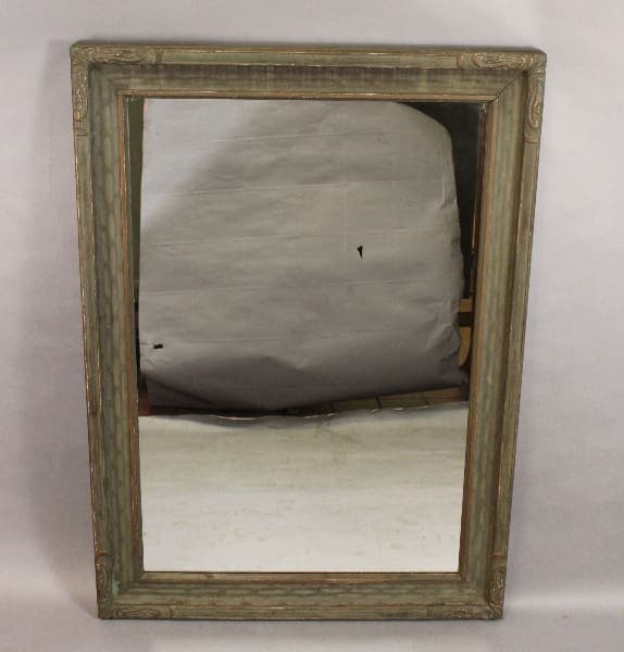 A damaged painting covered by a gray cloth is framed in the 15367. Large Scale Wood Carved Mirror, set against a plain background.