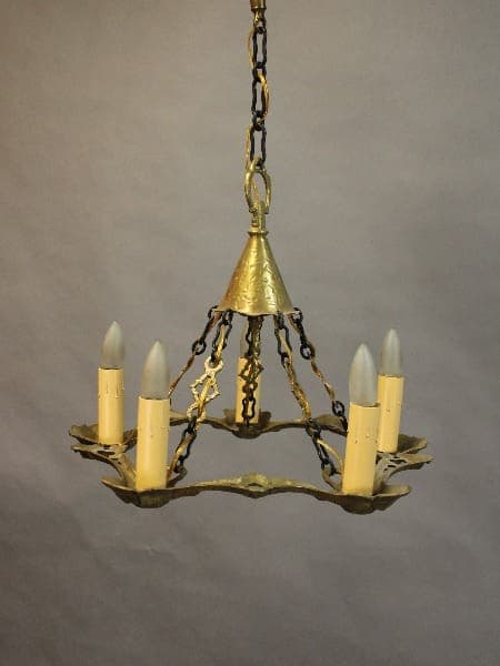15388. Simple Brass Chandelier Circa 1920's with five candle-shaped bulbs, suspended by a chain against a neutral background.