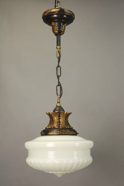 An antique 15725. 1920's Pendant With Acanthus Motif Fitter with ornate golden accents and a white frosted glass bowl, suspended by a chain against a neutral background.
