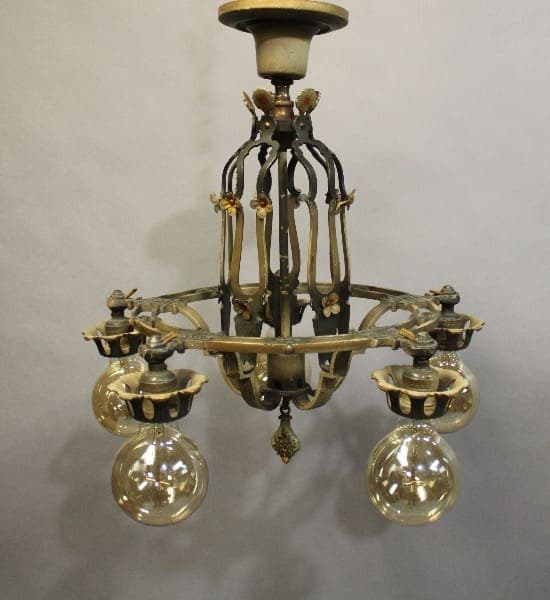 Sentence with product name: 15928. Original 1920's Ceiling Mount Chandelier With Down Lights with six arms and ornamental details, featuring three glass globes and floral accents against a neutral background.
