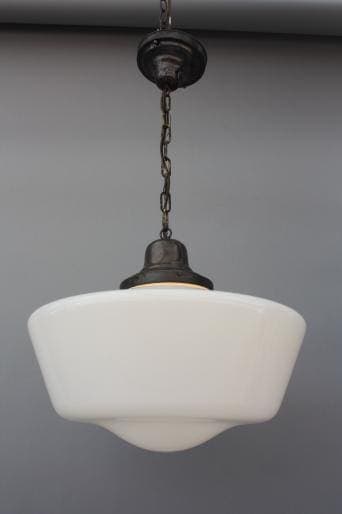 Vintage pendant light featuring a white inverted bowl shade with a metal chain and cap, against a gray background. 5845. Classic 1930's Milk Glass Pendant Light