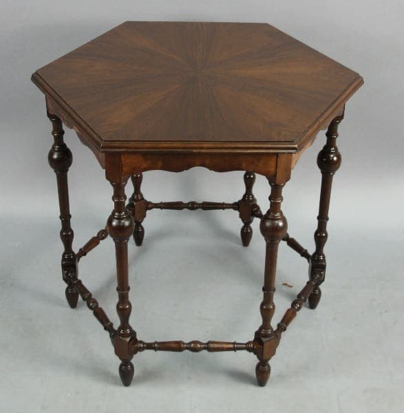 13753. 1920's Spanish Revival Hexagonal Table with ornate legs and a lower shelf, displayed against a gray background.