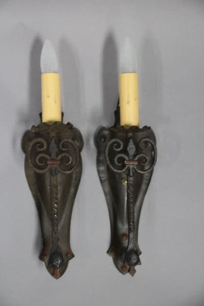 Wall sconces with candle-like bulbs.