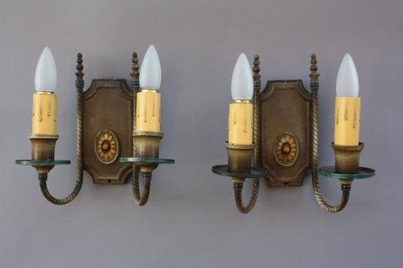 Decorative wall sconces with candle-like bulbs.
