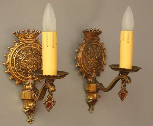 Vintage wall sconces with candle-like bulbs.