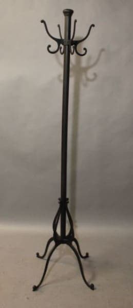 Metal coat rack with curved hooks.