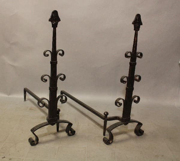 Decorative wrought iron fireplace andirons.