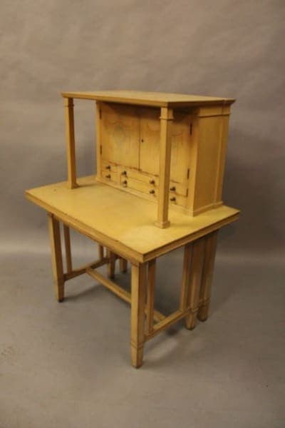 Wooden desk with hutch and drawers.