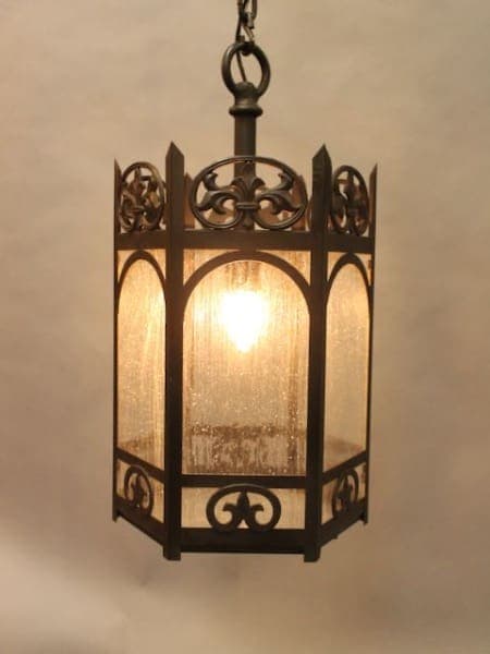 Ornate hanging lantern with glowing light.