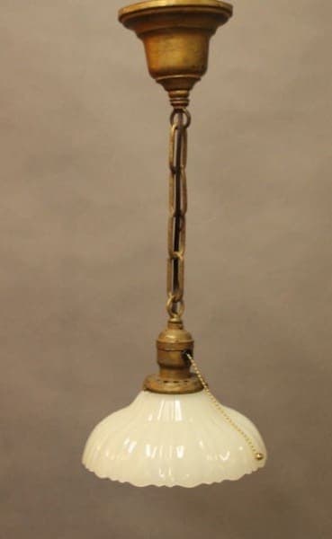 Vintage pendant light with chain pull.