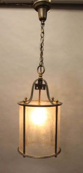 Hanging lantern with warm glowing light.