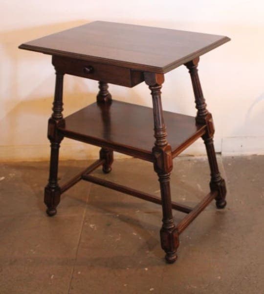 Wooden side table with single drawer.