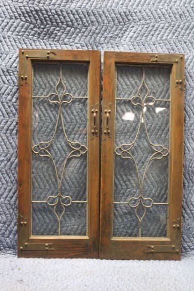 Antique wooden windows with decorative glass.