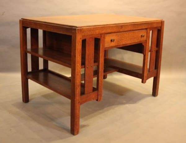 Wooden desk with shelves and a drawer.