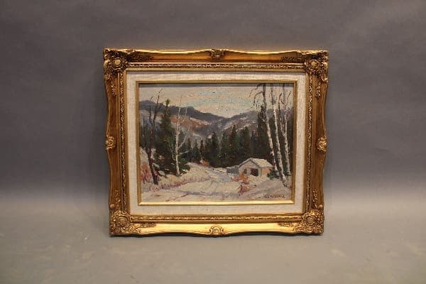 Framed winter landscape painting with snow.