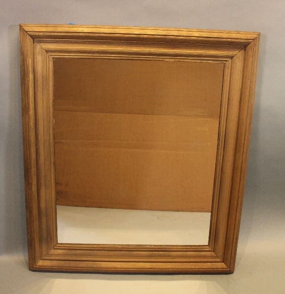 Wooden framed rectangular wall mirror.