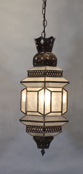Hanging ornate lantern with geometric design.