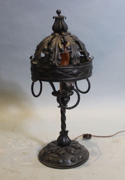 Ornate wrought iron decorative table lamp.