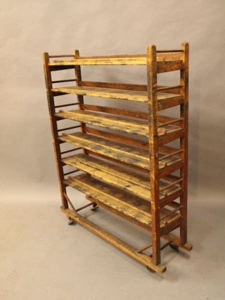 16573. Fun Turn Of The Century Factory Shoe Rack On Wheels