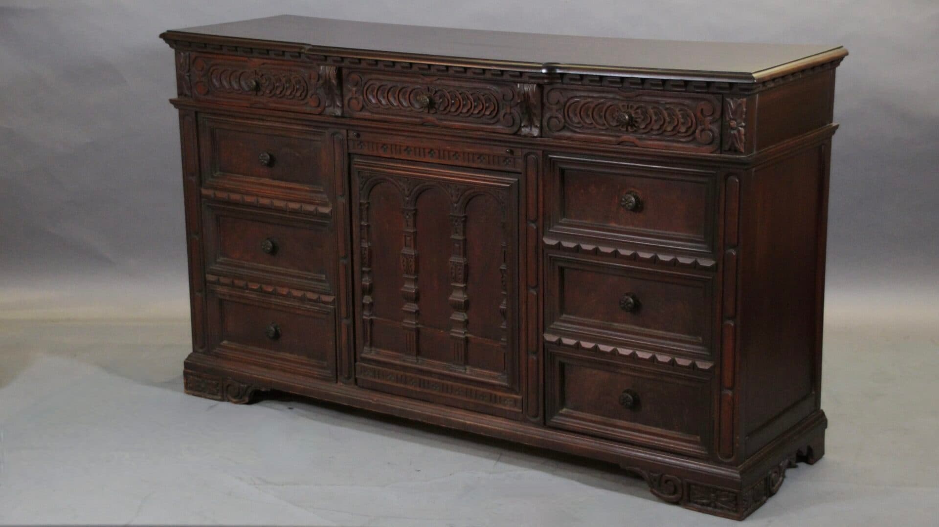 40544. Carved 1920’s Spanish Revival Carved Walnut Side Piece