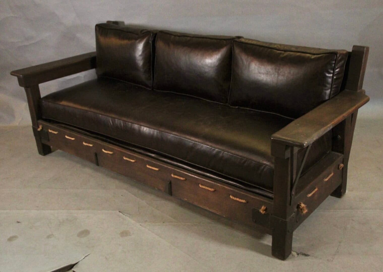 43807. Monterey Period Mahogany Imperial Sofa With Leather Upholstery