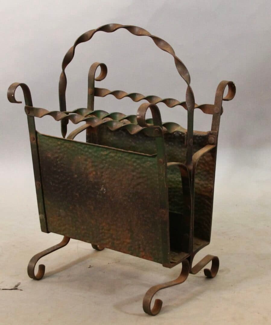 43876. 1920’s Spanish Revival Magazine Rack