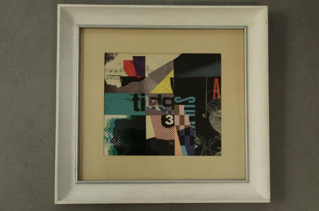 Framed abstract collage with colorful geometric shapes