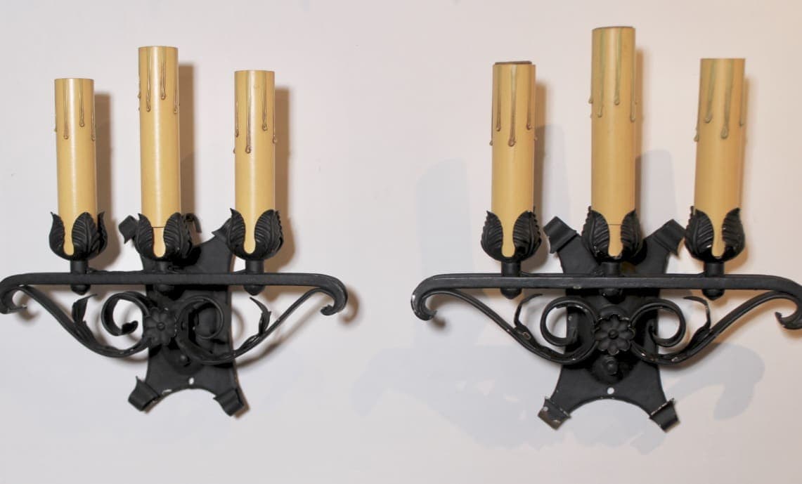 Pair of wrought-iron wall candle sconces
