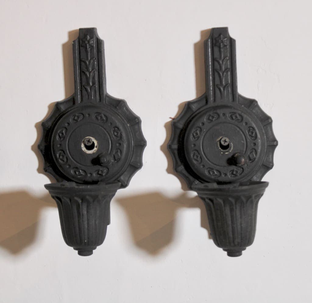 Pair of vintage black ornate wall sconces