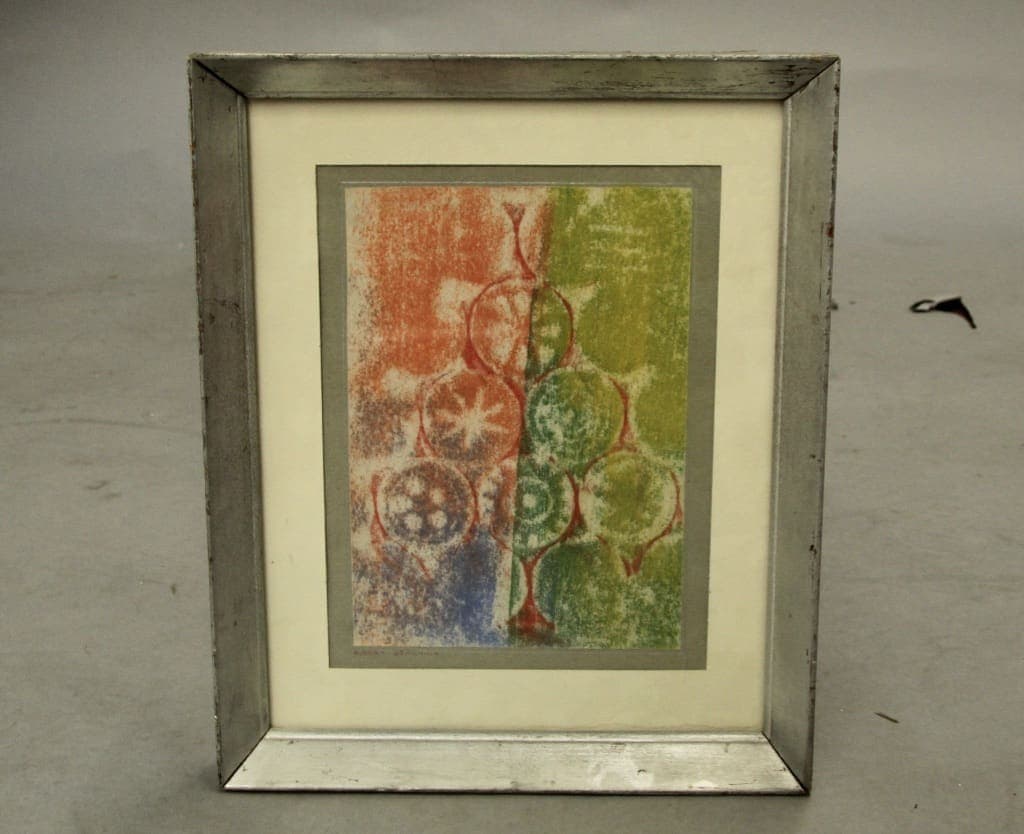 Framed abstract print with colorful circular pattern