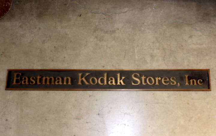 Bronze Eastman Kodak Stores Sign