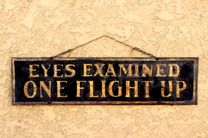 Old Gilded Opticians Tin Sign