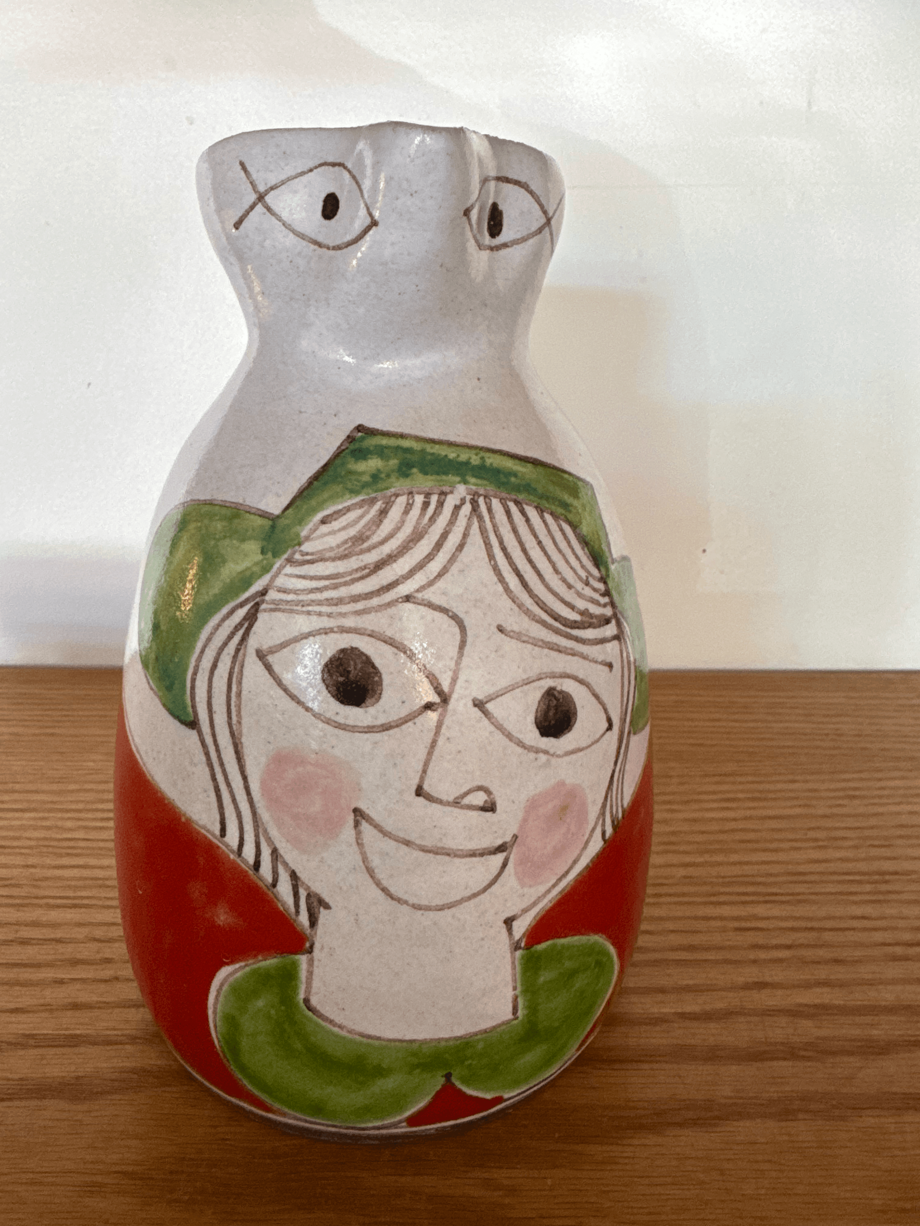 'Girl with orange' water pitcher