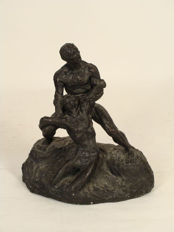 Patinated composition sculpture