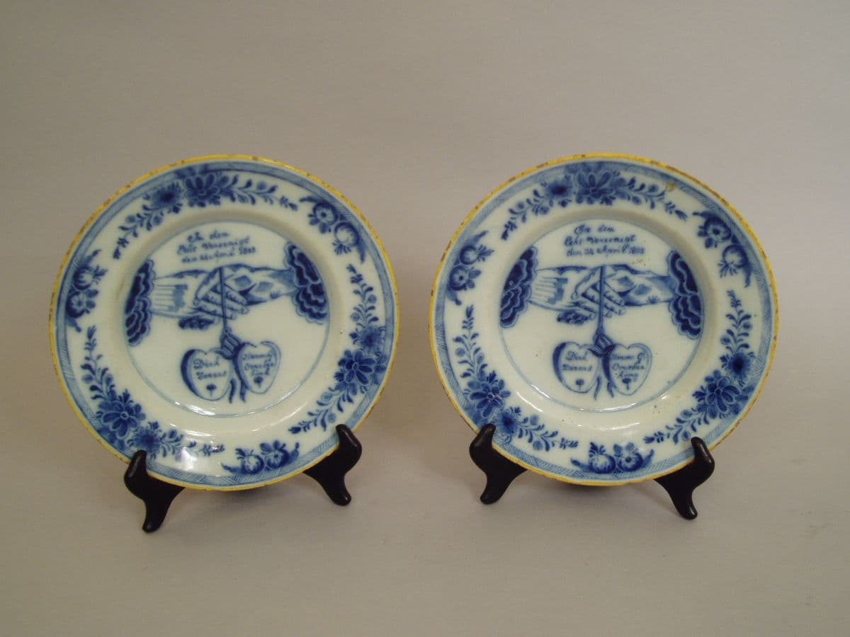 Pair of Dutch blue and white plates, dated 1803