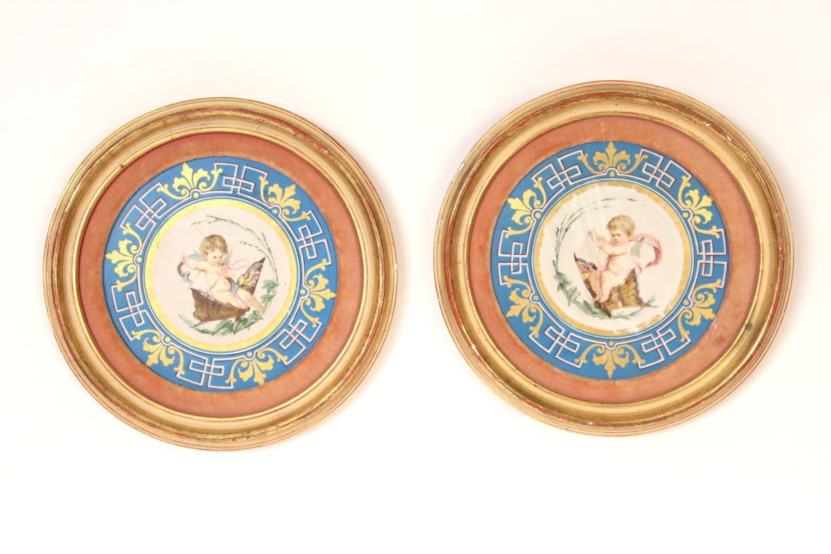 Pair of framed porcelain rondels