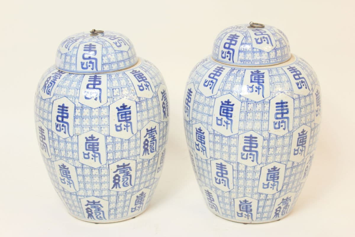 Pair of Chinese blue and white covered vases