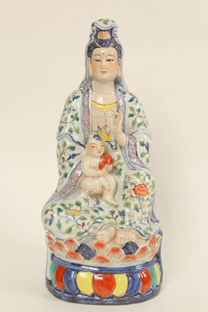 Asian polychrome decorated porcelain mother and child