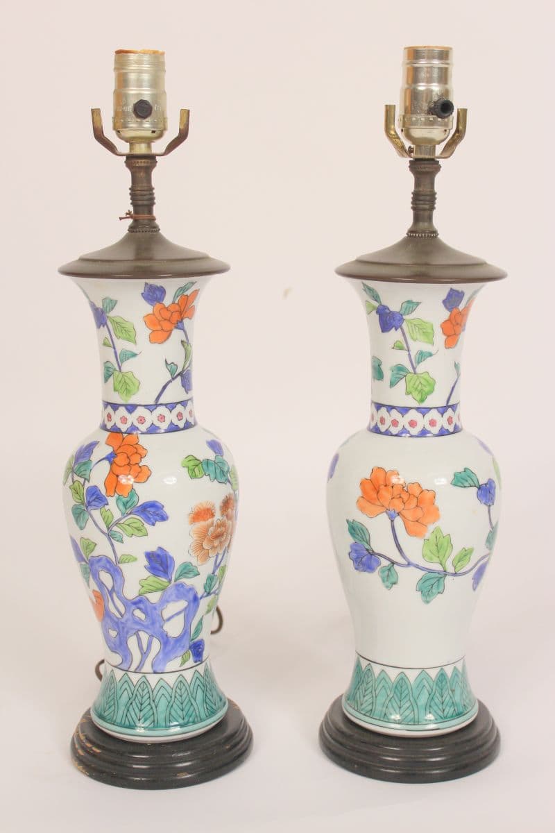 Pair of Chinese polychrome decorated porcelain lamps