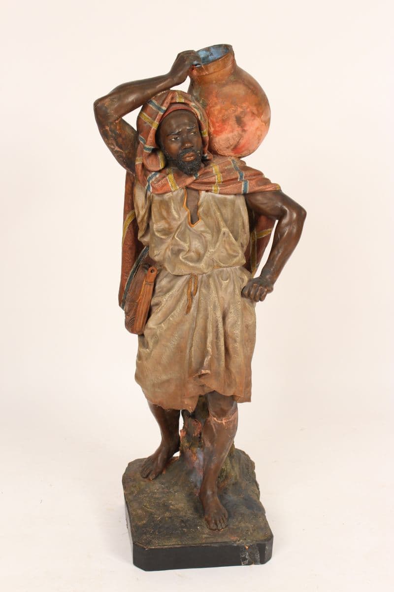 Painted terra cotta Nubian water carrier, by Joseph Le Guluche (1849-1915)