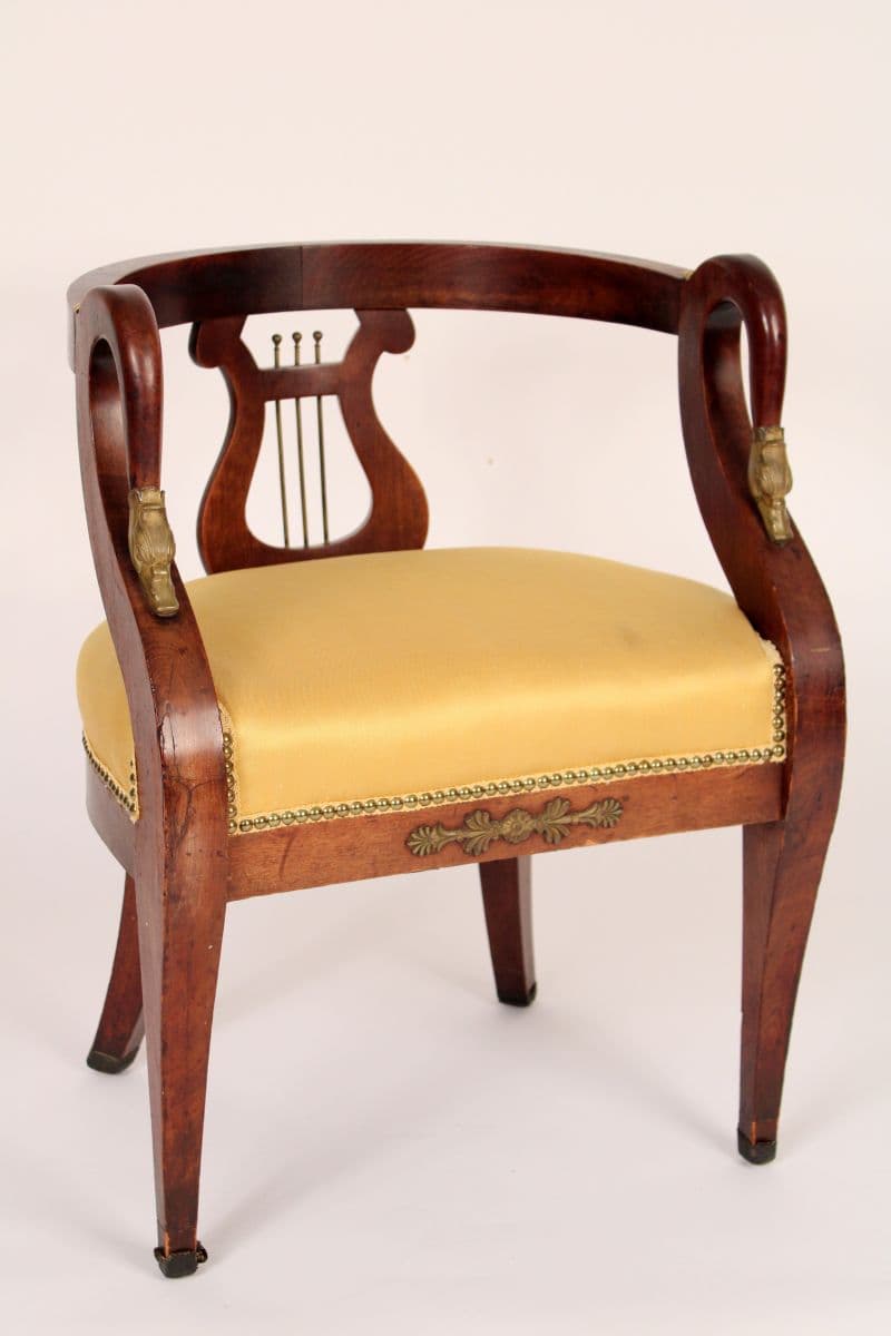 Antique Empire style barrell back armchair